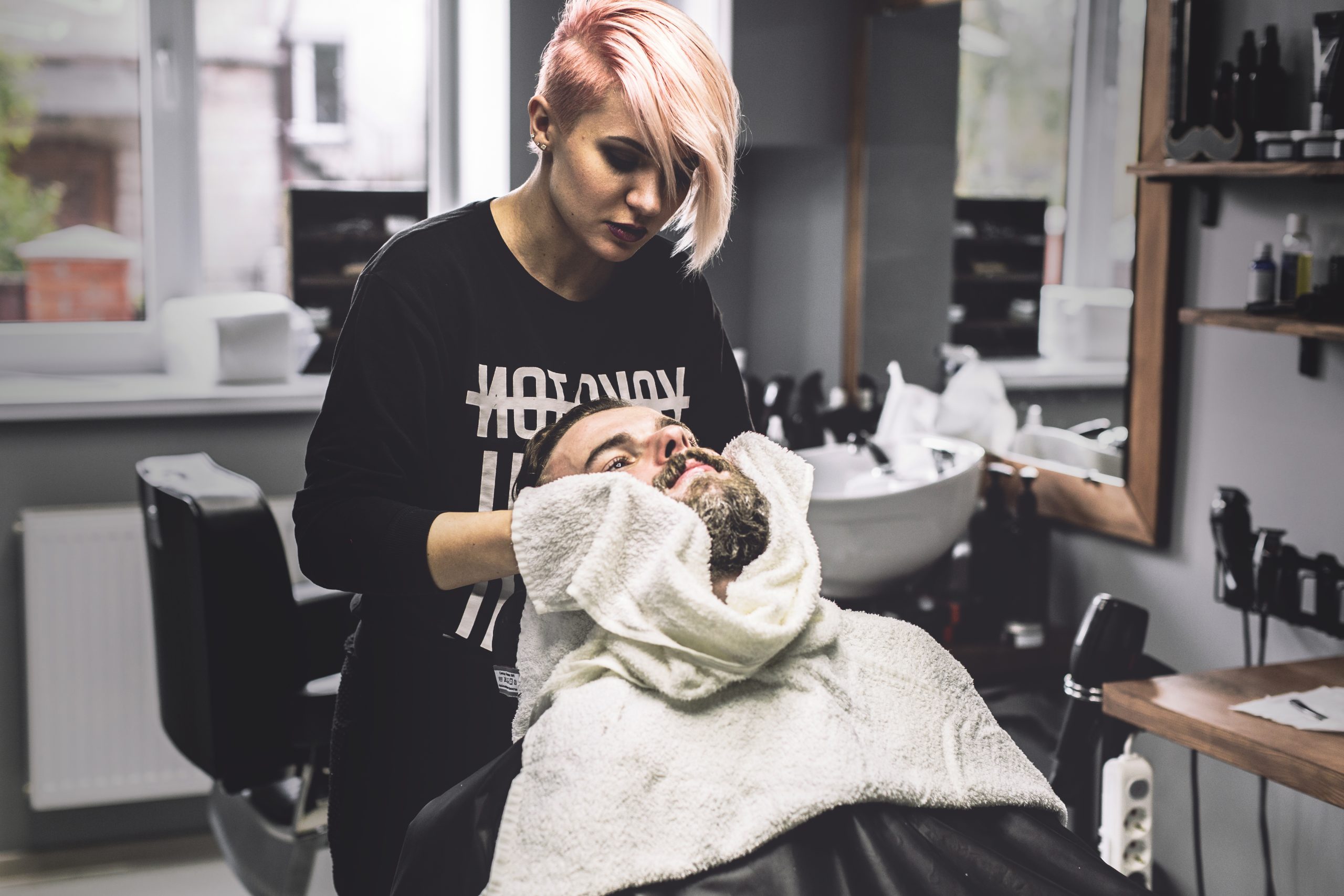 Barber service being filmed for short-form social media content